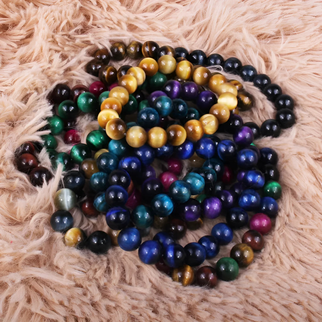 Natural tiger eye crystal beaded bracelet for men and women on a white background.