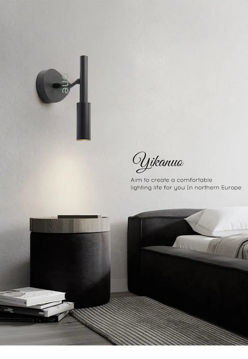 Black wrought iron wall lamp with modern design and three colour temperature lighting options