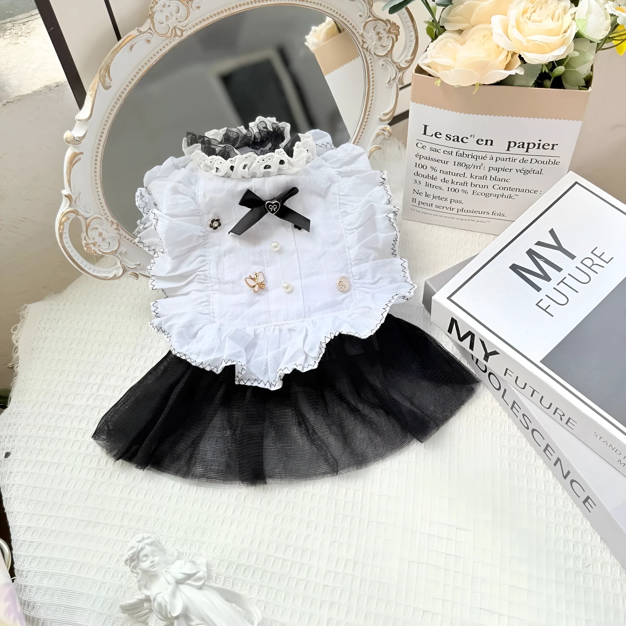 White polyester dog dress with gauze skirt in princess style, shown in size options for small dogs