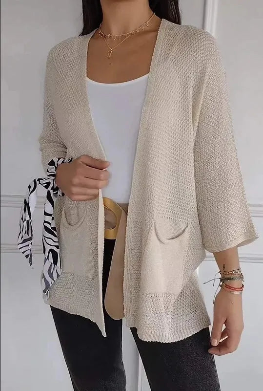 Women's waffle texture cardigan coat in army green with nine-quarter sleeves and pockets.
