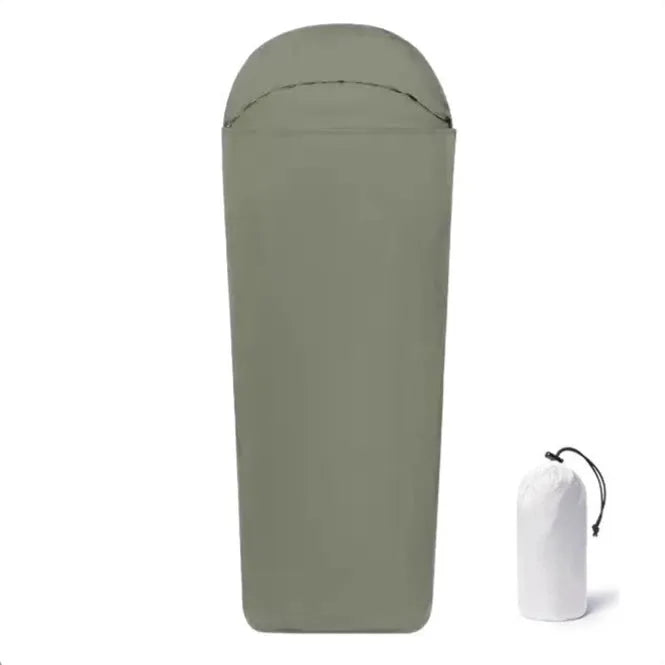 Blue lightweight nylon camping sleeping bag with mummy design shown laid out