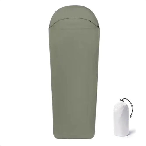Blue lightweight nylon camping sleeping bag with mummy design shown laid out