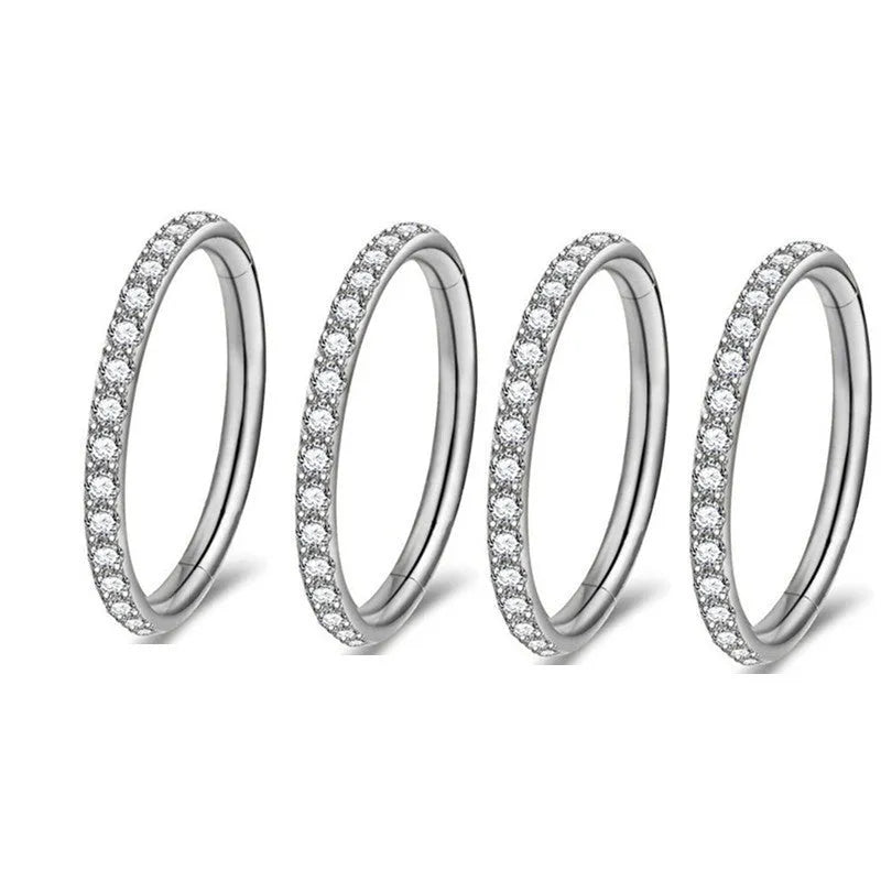 A seamless stainless steel nose ring hoop showing gold and rose gold electroplated colour options.