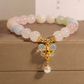 Morganite bracelet with colourful natural stone butterfly pendant on crystal bracelet