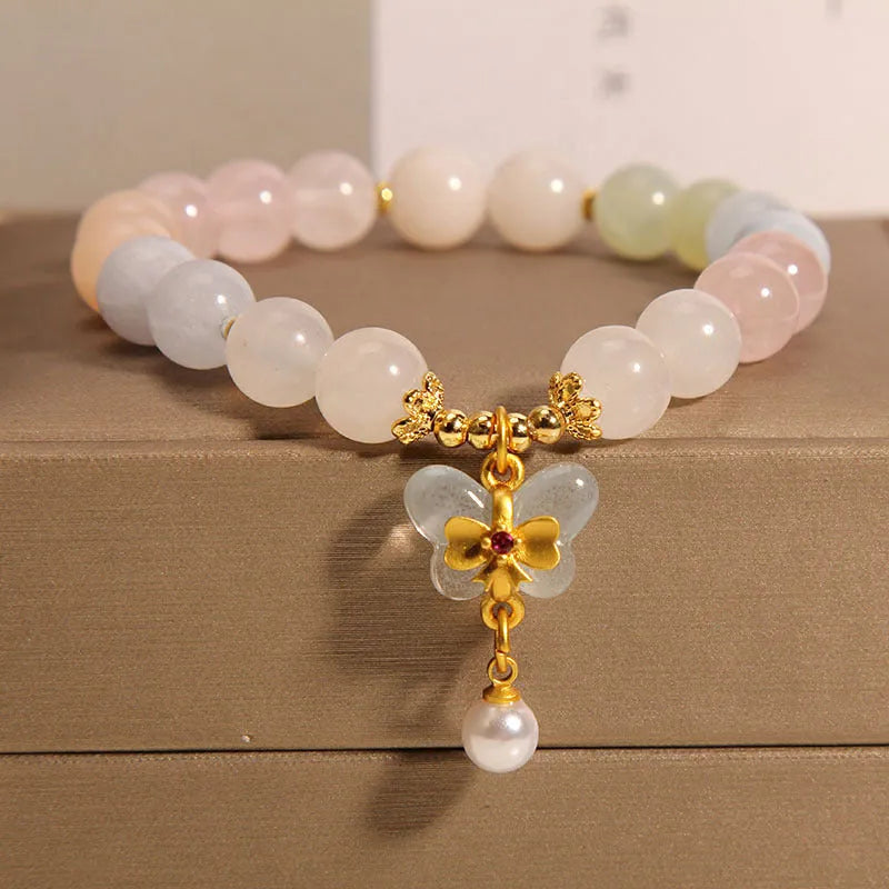 Morganite bracelet with colourful natural stone butterfly pendant on crystal bracelet