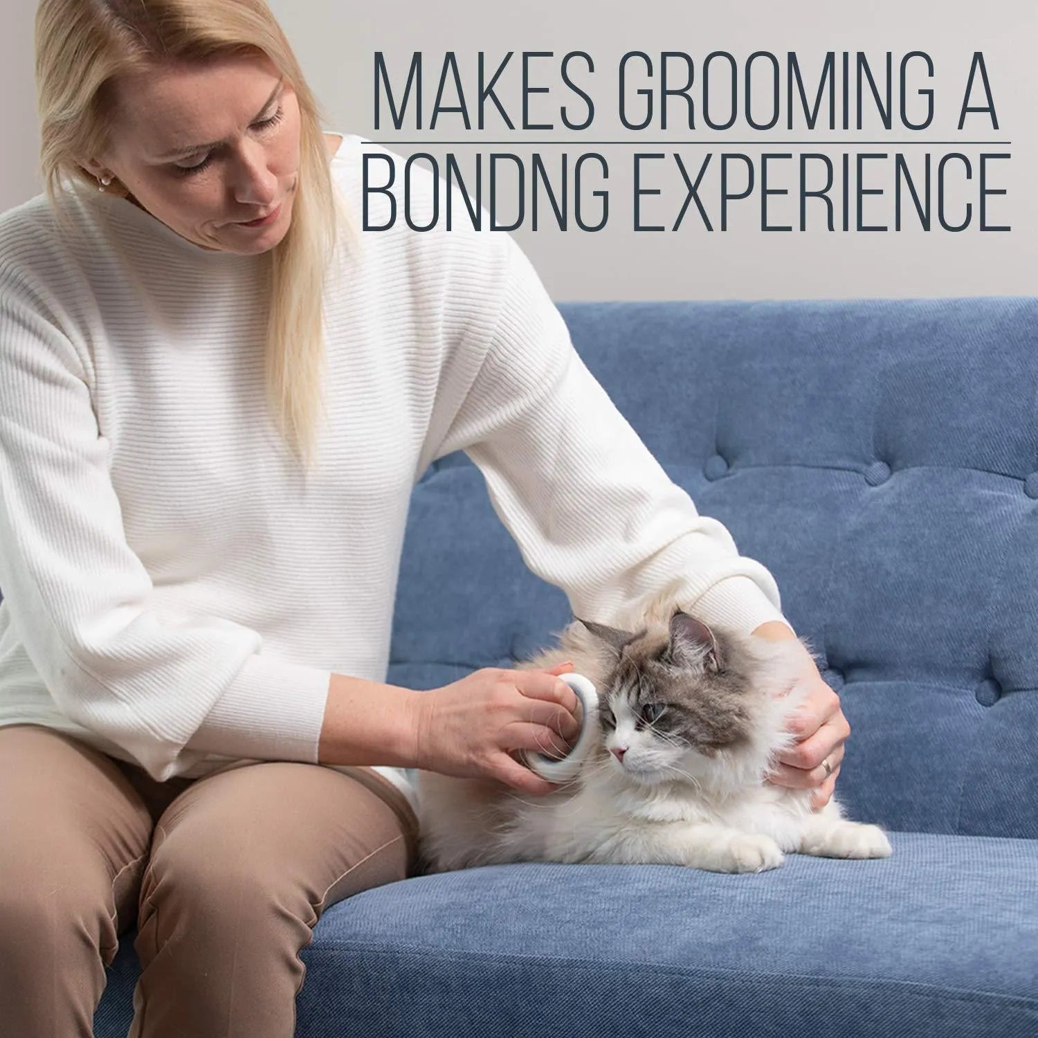 Blue pet grooming comb with ergonomic handle for deshedding and dematting cats and dogs
