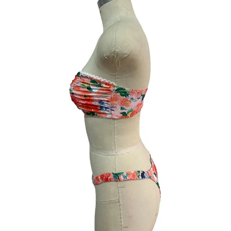 Printed tube top bikini set with lace detail and floral pattern in blue colour