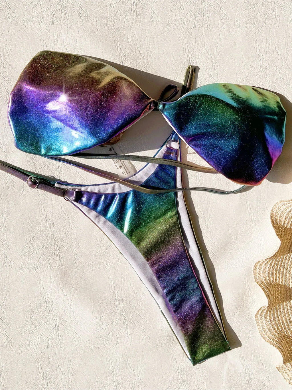 Women's gradient purple bikini swimsuit set on a mannequin.