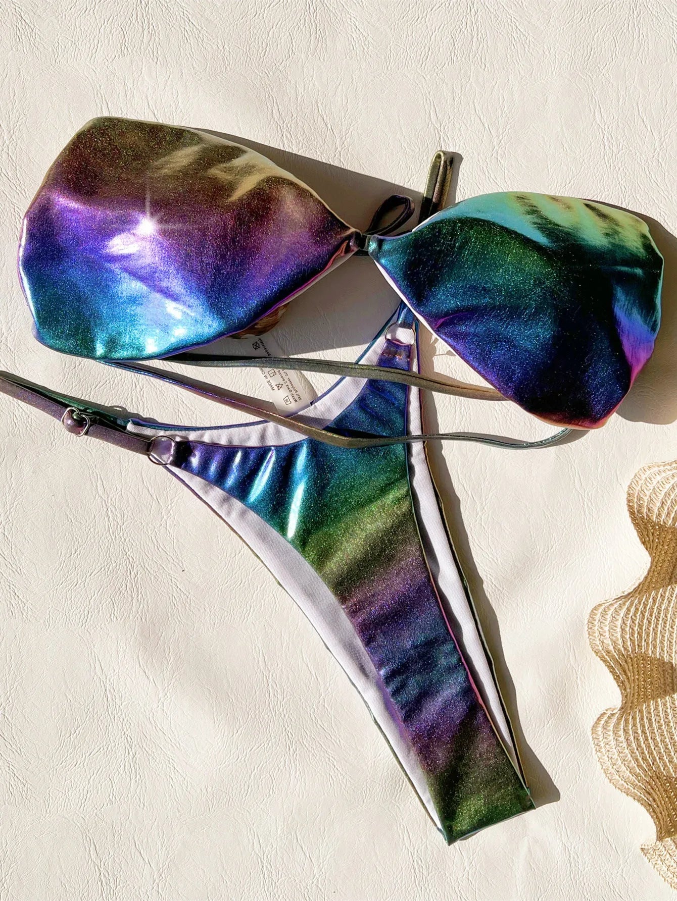 Women's gradient purple bikini swimsuit set on a mannequin.