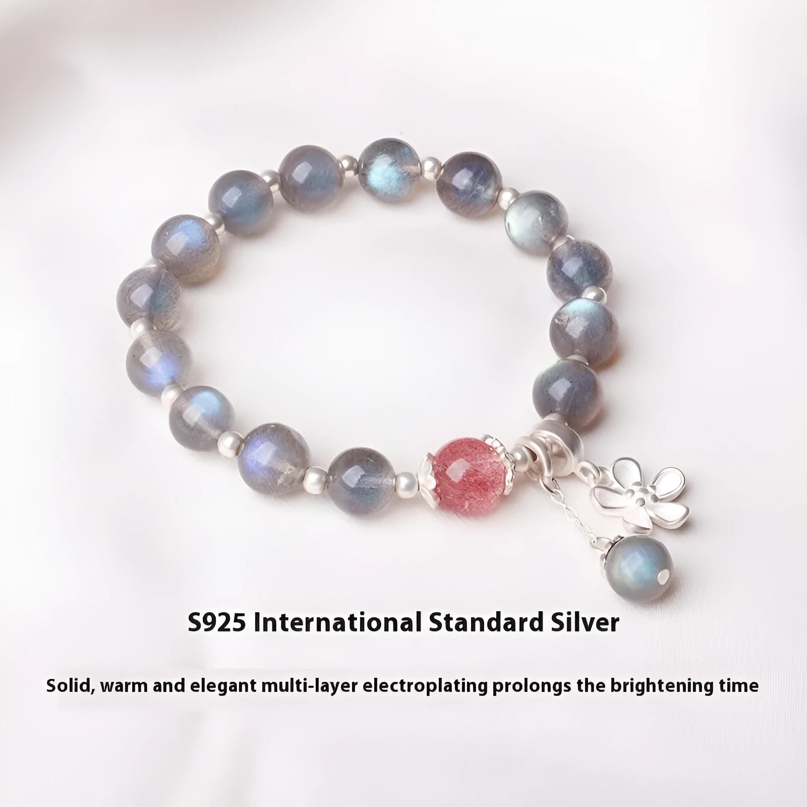 Women's silver bracelet with grey moonlight finish, 7.5mm lime and strawberry crystals, zodiac animal motif, and honeysuckle charm.
