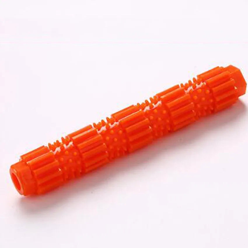 Green and orange durable rubber dog chew toy with textured surface for aggressive chewers.
