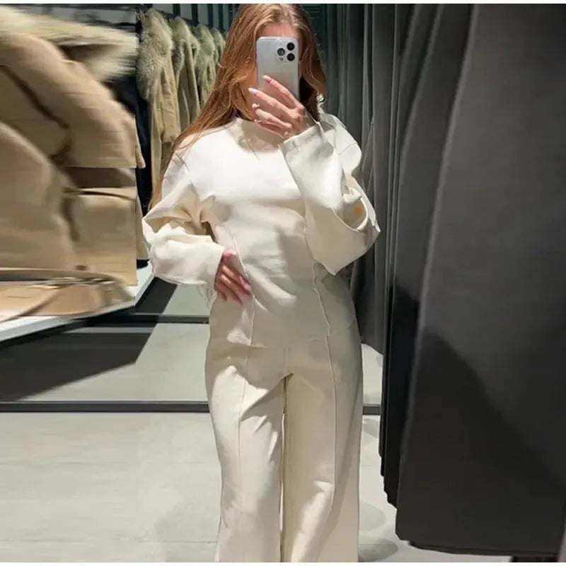 Women's black polar fleece suit set with O-neck top and wide leg trousers