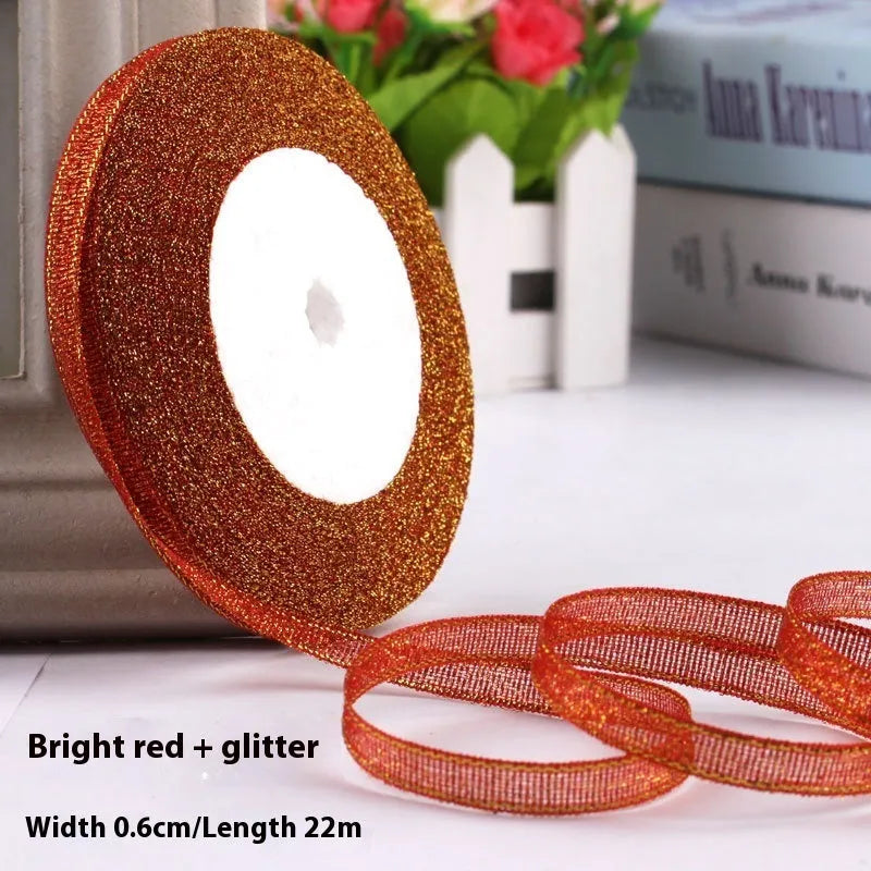 Roll of narrow 0.6cm wide polyester satin ribbon in a choice of colours, showing 22 metre length.