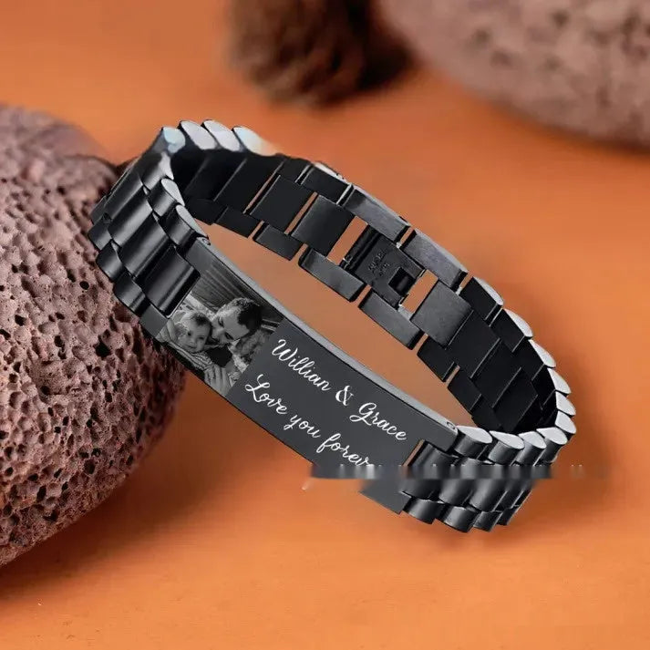 Titanium steel bracelet with lettering on curved piece, heart shape design in black or grey finish