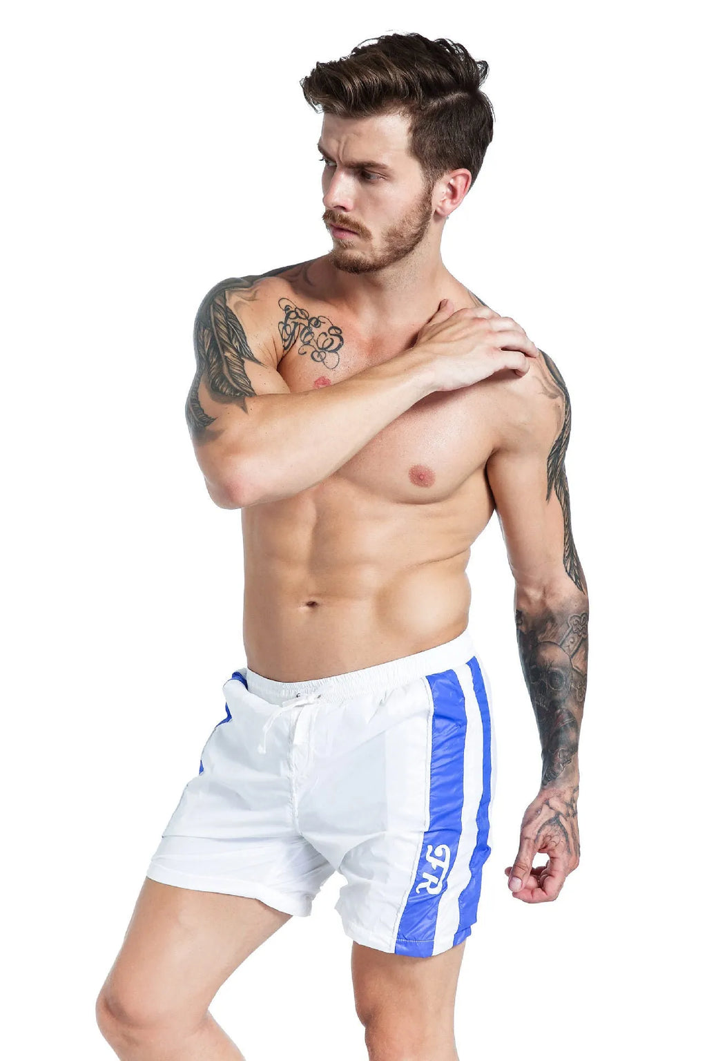 Men's blue slim fit lace-up sports shorts made from stretch polyester with built-in padding.