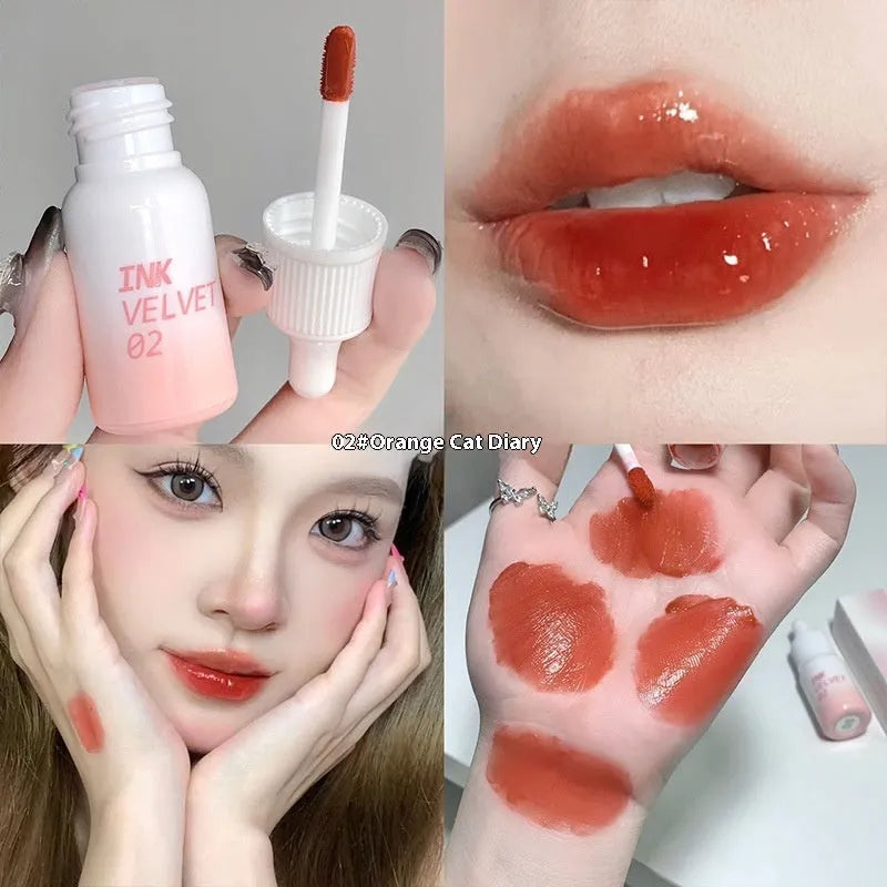 Mirror Lip Lacquer lip gloss tube in one of four shades: Spring Day Wilderness, Orange Tabby Cat Diary, Low-key Charming, or Misty Berry.