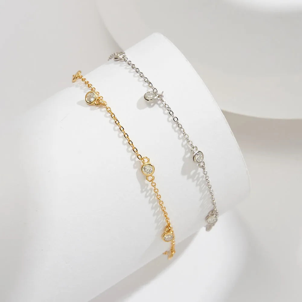 Women's sterling silver anklet with geometric zirconium pendant in gold and white gold colour options