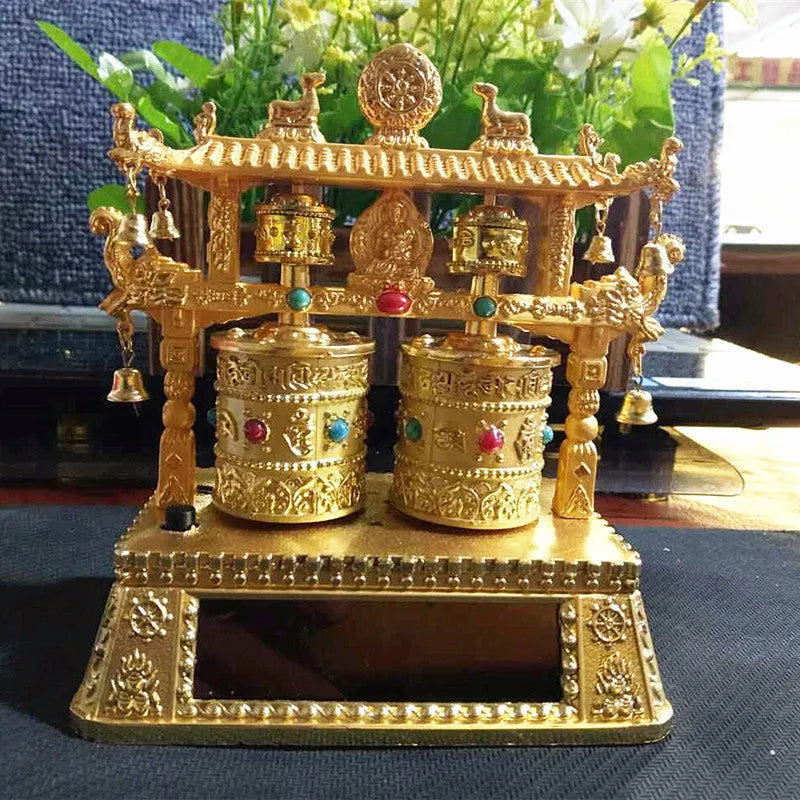 Alloy car prayer wheel decoration with traditional Chinese license plate style.