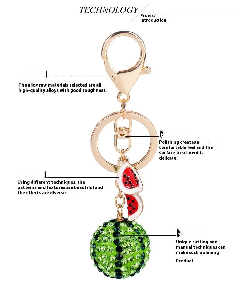 Green zinc alloy watermelon-shaped keychain on a keyring, showing detailed fruit slice design.