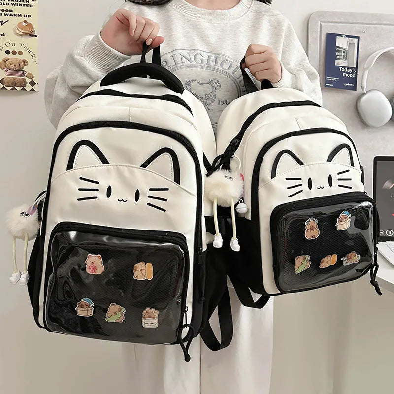 Korean cartoon animation style backpack in two sizes with curved shoulder straps.