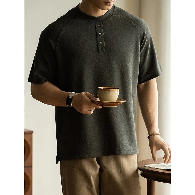 Casual loose top with raglan sleeves in terry texture fabric showing smoky grey colour option