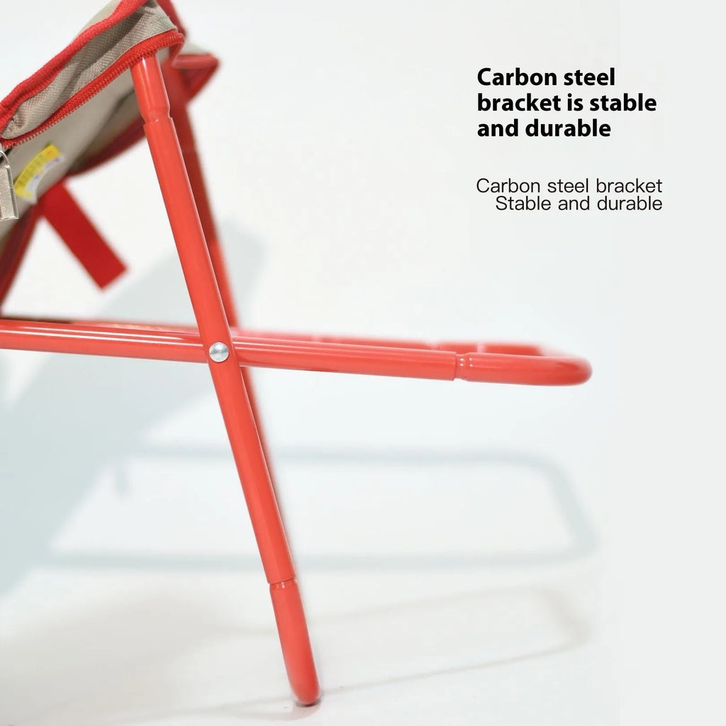 Lightweight foldable camp chair stool in Oxford cloth, shown in a khaki colour, folded into its compact pencil box shape.