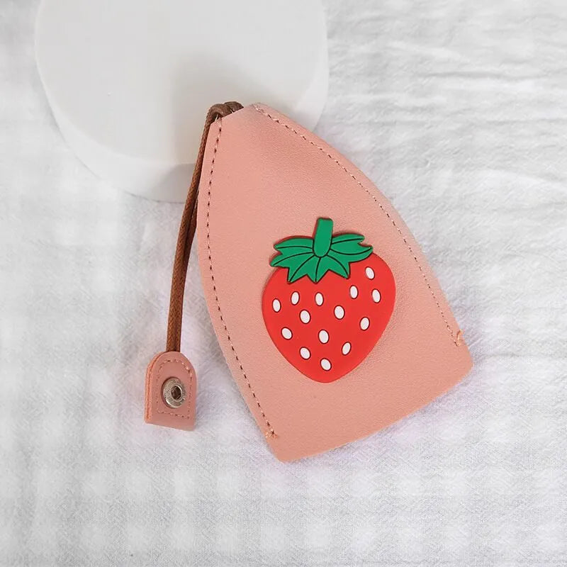 Cartoon pull-out key case in PU leather with colourful design, showing compact 14cm by 7.5cm dimensions
