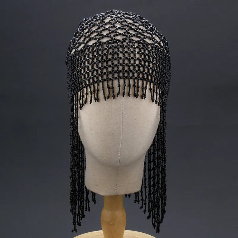 Belly dance headwear with alloy base, handmade beading, and 16.5cm tassels in silver or black mesh decoration
