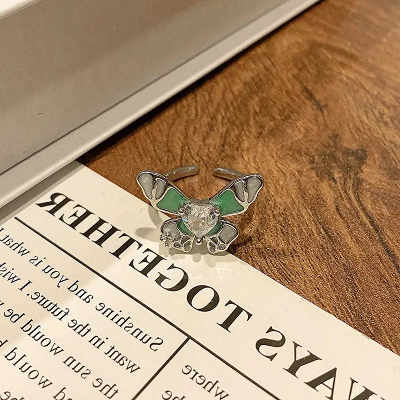Creative Chinese butterfly women's copper ring with dripping oil treatment process in simple style.