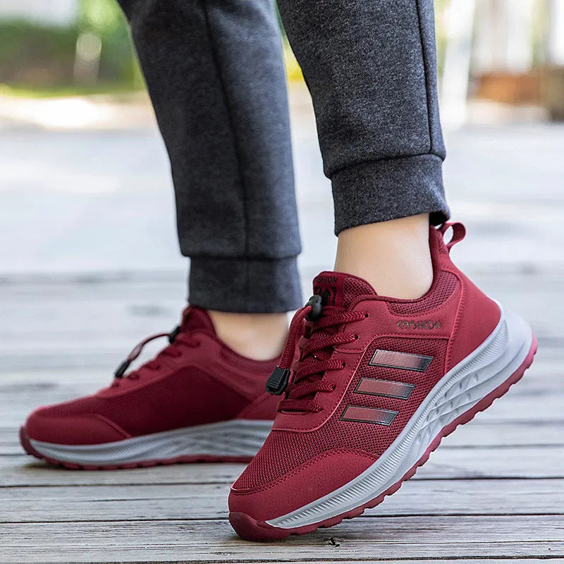 Breathable non-slip casual shoes with mesh upper and elastic band closure in black, dark grey, purple, and purplish red.