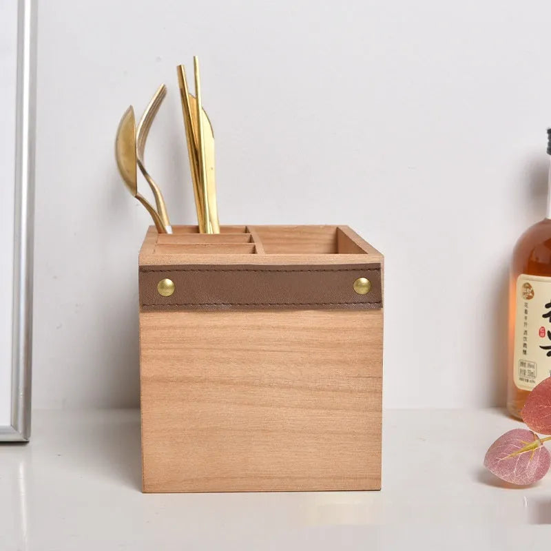 Solid wooden kitchen storage box with internal grid divider for knives, forks, and chopsticks.