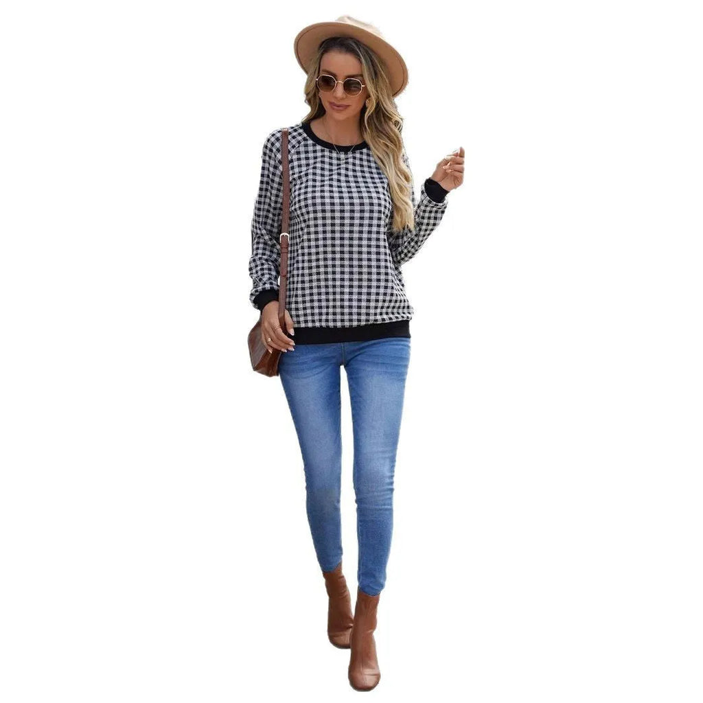 Black Japanese style plaid pullover sweater with long sleeves and printed pattern