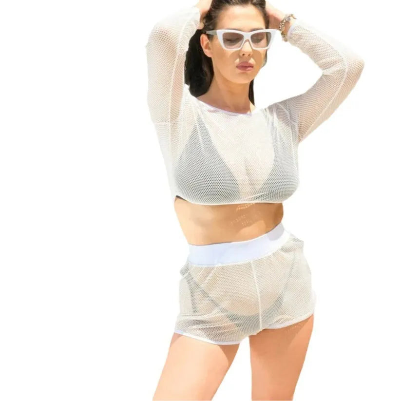 White transparent women's two-piece swimsuit set with a skirt for the beach.