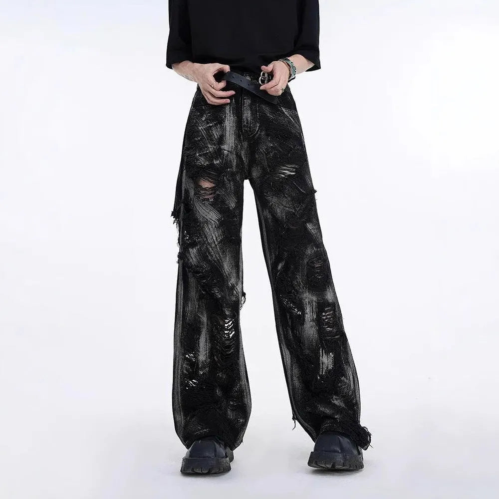 Men's heavyweight washed denim trousers in American wasteland style with graffiti details on a mid waist cut.