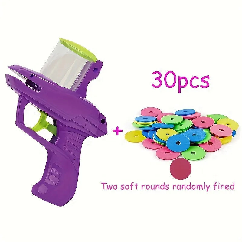 Interactive cat toy launcher with foam disc in green or purple colour