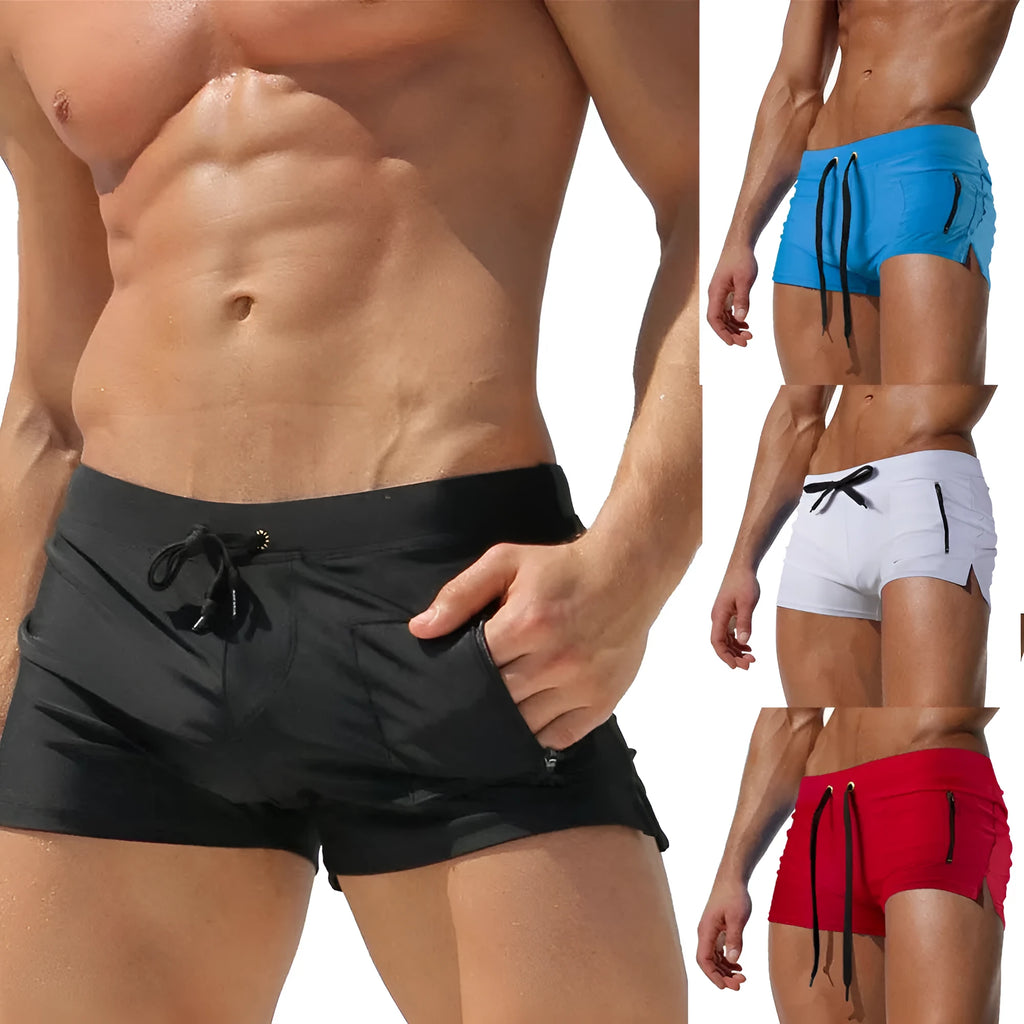 Men's black high-waisted swimming trunks with a white lace-up front detail, laid flat.