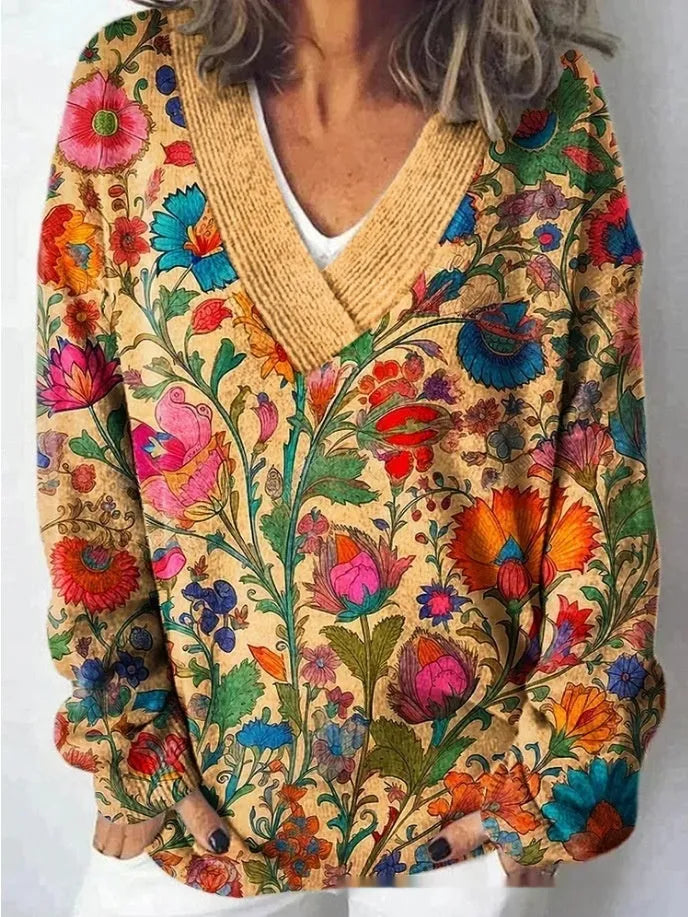 Women's V-neck long sleeve sweatshirt with a blue and white 3D floral print pattern.