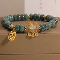Women's natural emerald green jade bracelet with alloy safety lock clasp and abacus beads design