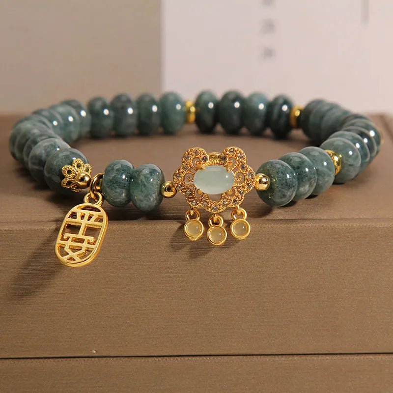 Women's natural emerald green jade bracelet with alloy safety lock clasp and abacus beads design