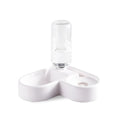 White indoor pet water fountain for cats and dogs on a kitchen floor