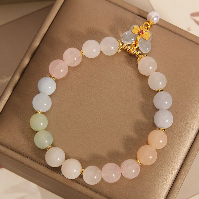 Morganite bracelet with colourful natural stone butterfly pendant on crystal bracelet