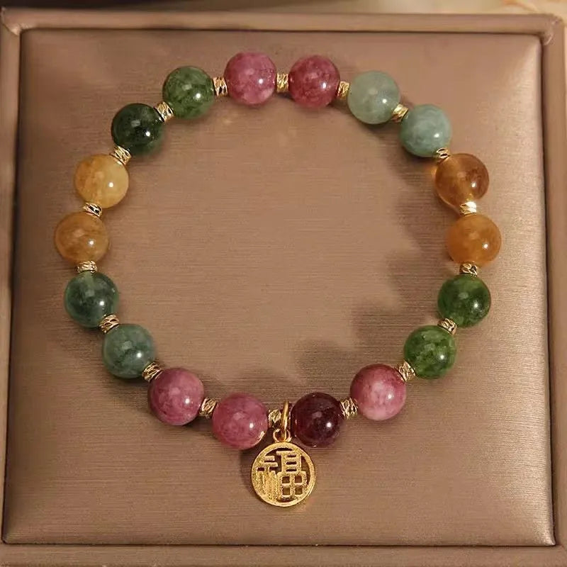 Natural colour tourmaline bracelet with electroplating in flower or fu character geometric design