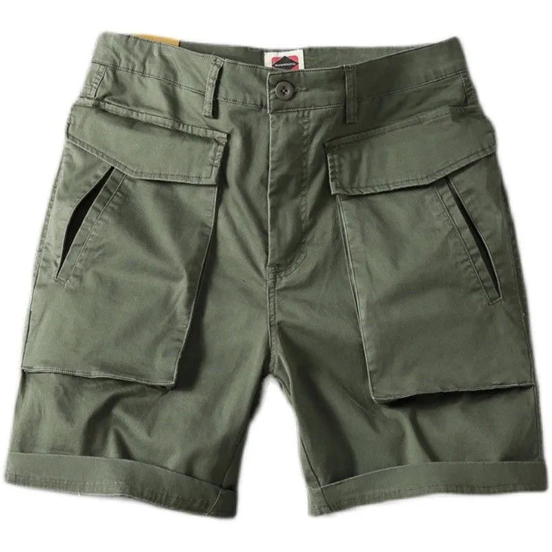 Men's stretch cotton cargo shorts in army green showing multiple pockets and straight-leg fit.