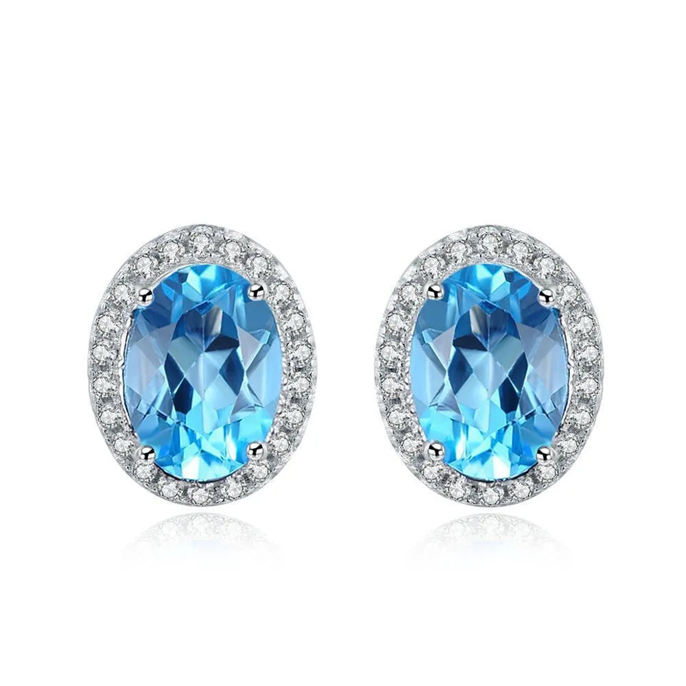 925 sterling silver blue topaz geometric jewellery set with earrings, ring, necklace, and pendant