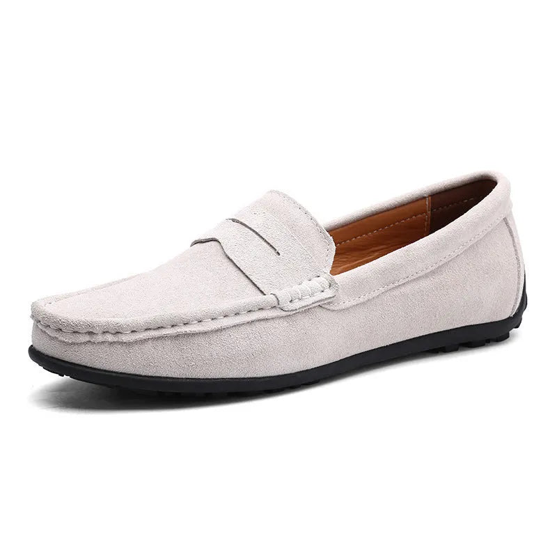 Men's suede leather Gommino casual shoes with flat rubber sole in black colour.