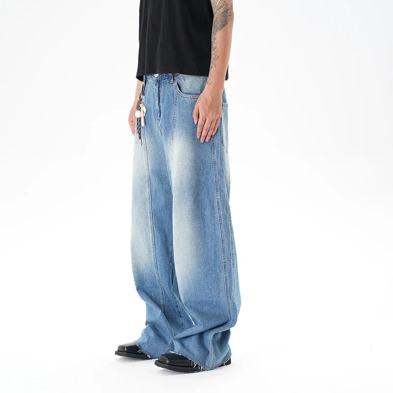 Light blue washed vintage women's wide leg jeans with a machete cut design on a front zip fly.