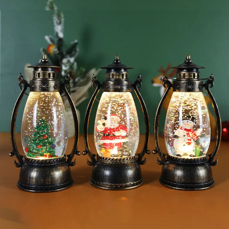 Crystal ball LED Christmas ornament showing snowman and elderly oil lamp design variations