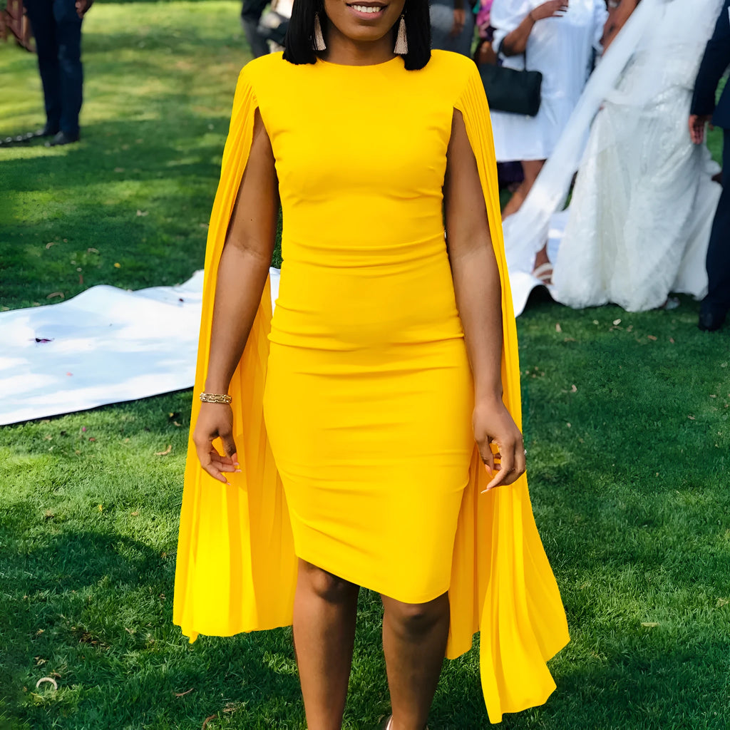 Round neck evening gown with pleated shawl collar and high waist in yellow colour