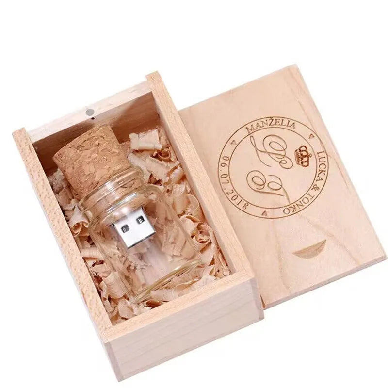 Transparent glass bottle USB flash drive with a wooden stopper cap, 60mm long.