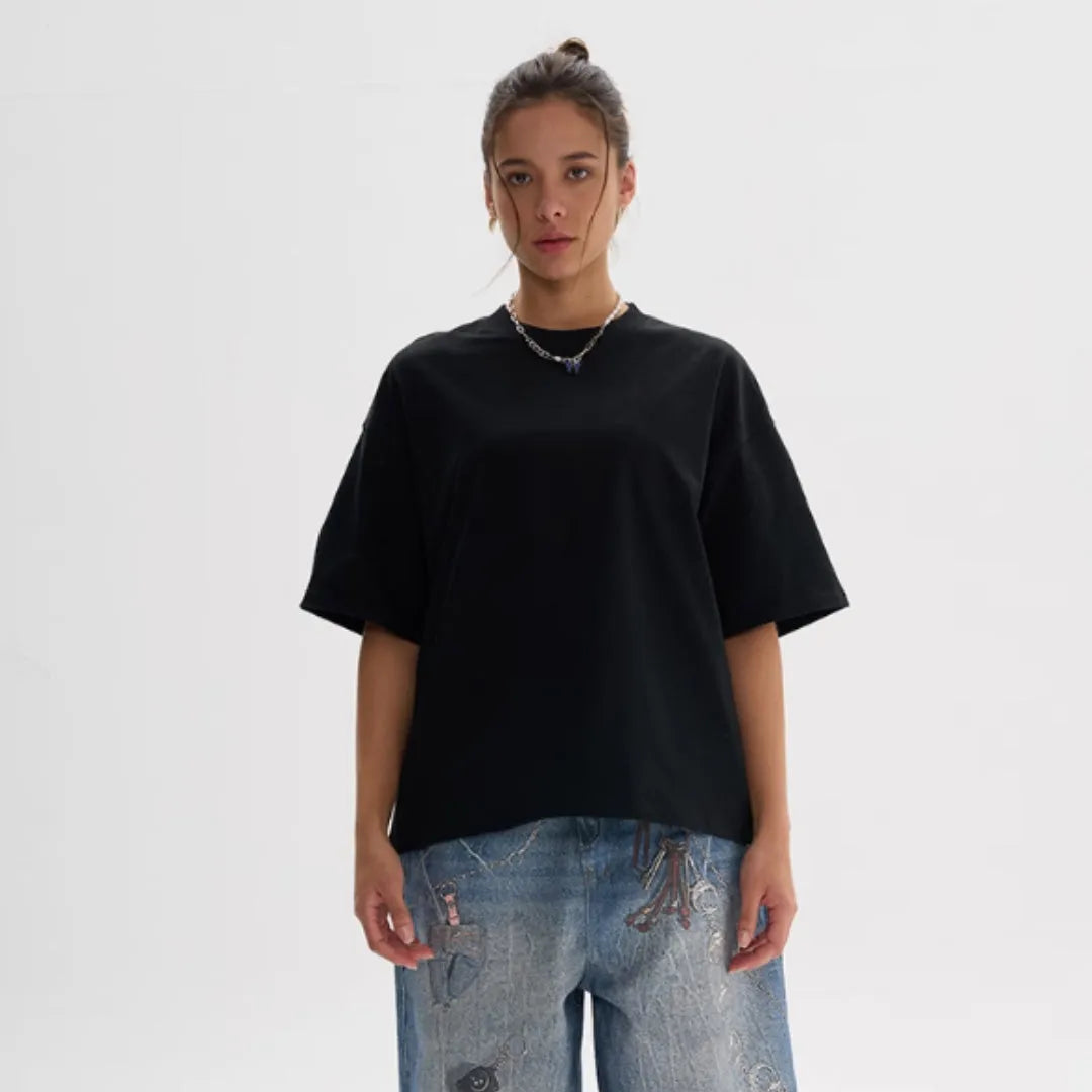 American style loose fit pure cotton t-shirt in apricot colour on a hanger.